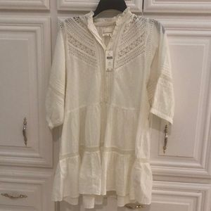 Brand new top for sale. It runs big